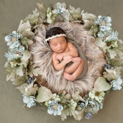 Newborn session Girl with Green and Aqua Flower Basket Setup in Gainesville Florida