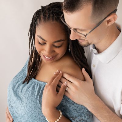 Mom and Dad Pose for Professional Maternity Photo Session