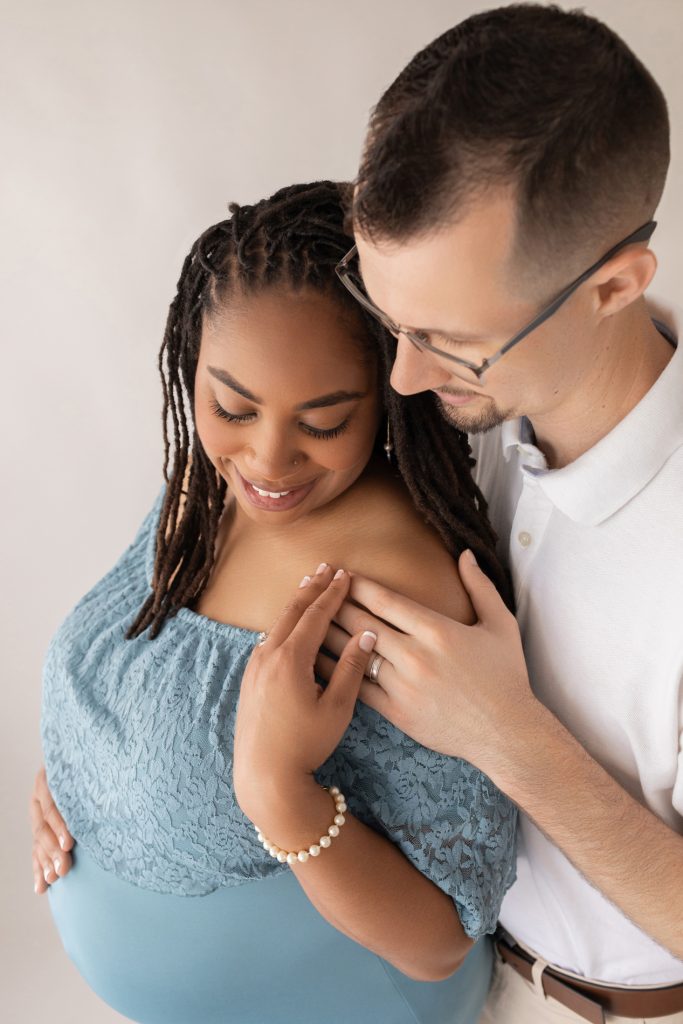 Mom and Dad Pose for Professional Maternity Photo Session