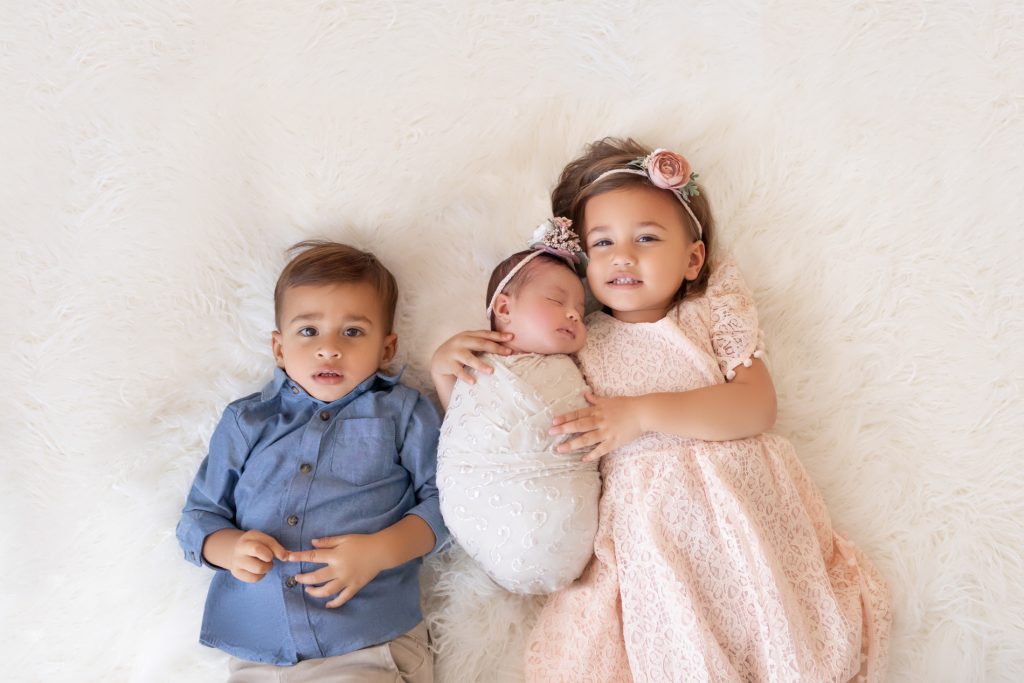 Siblings Professional Photo with Newborn Baby Sister